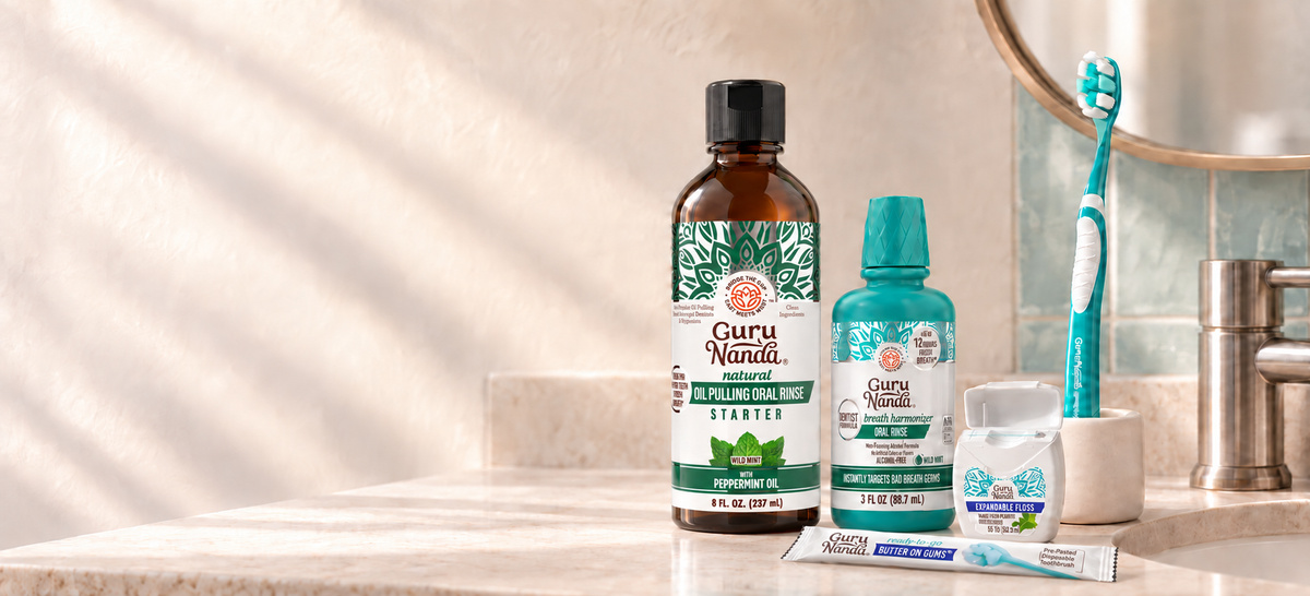 GuruNanda oral-care essentials on a sunlit bathroom vanity.